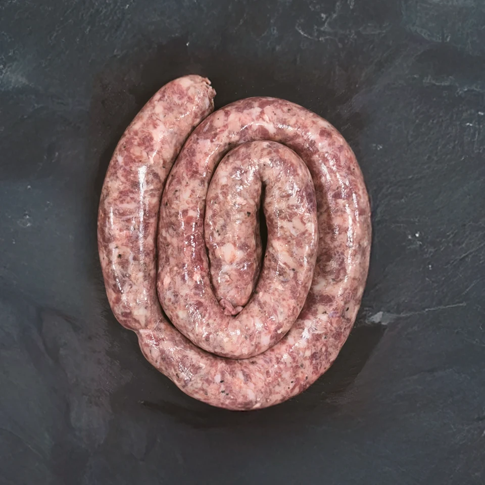Coiled Procter's sausage on a slate board