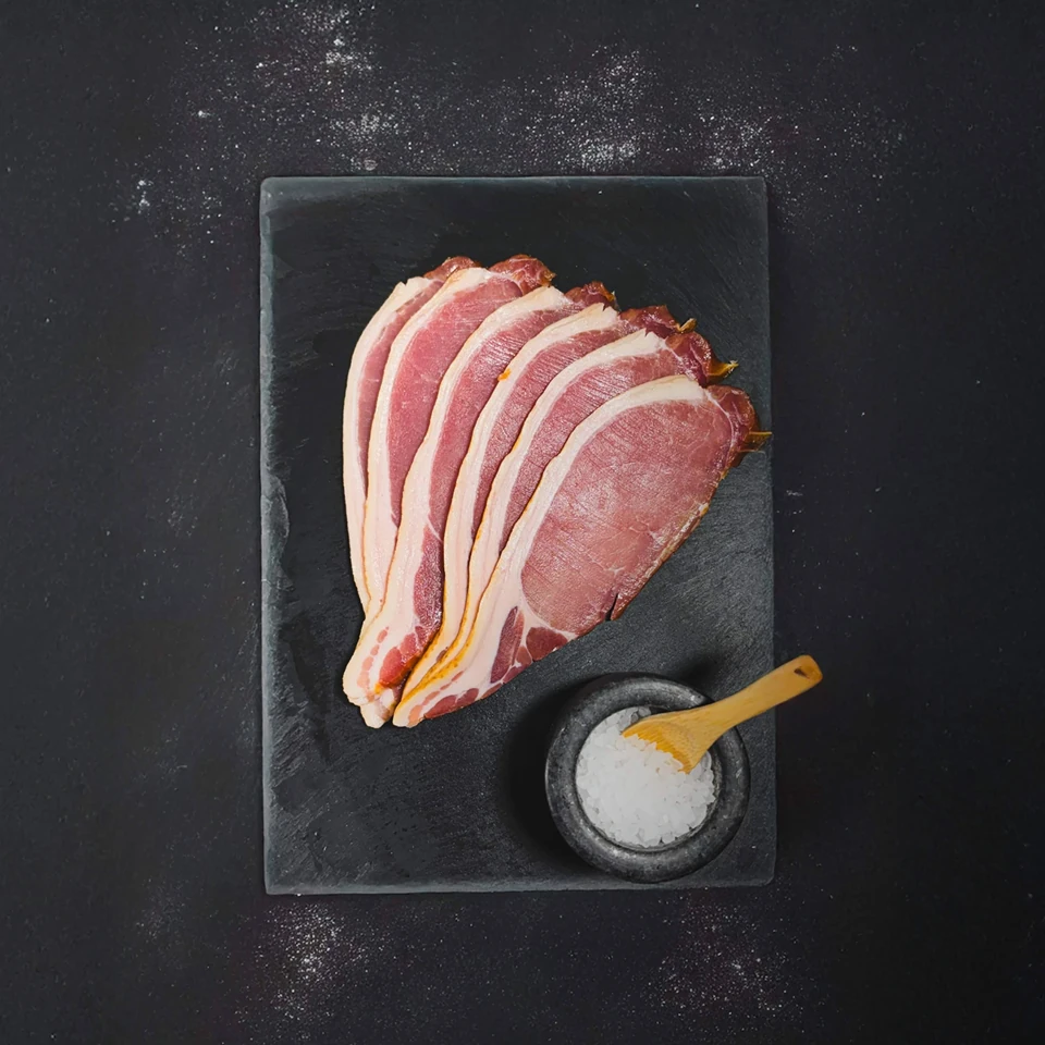 Sliced bacon with sea salt